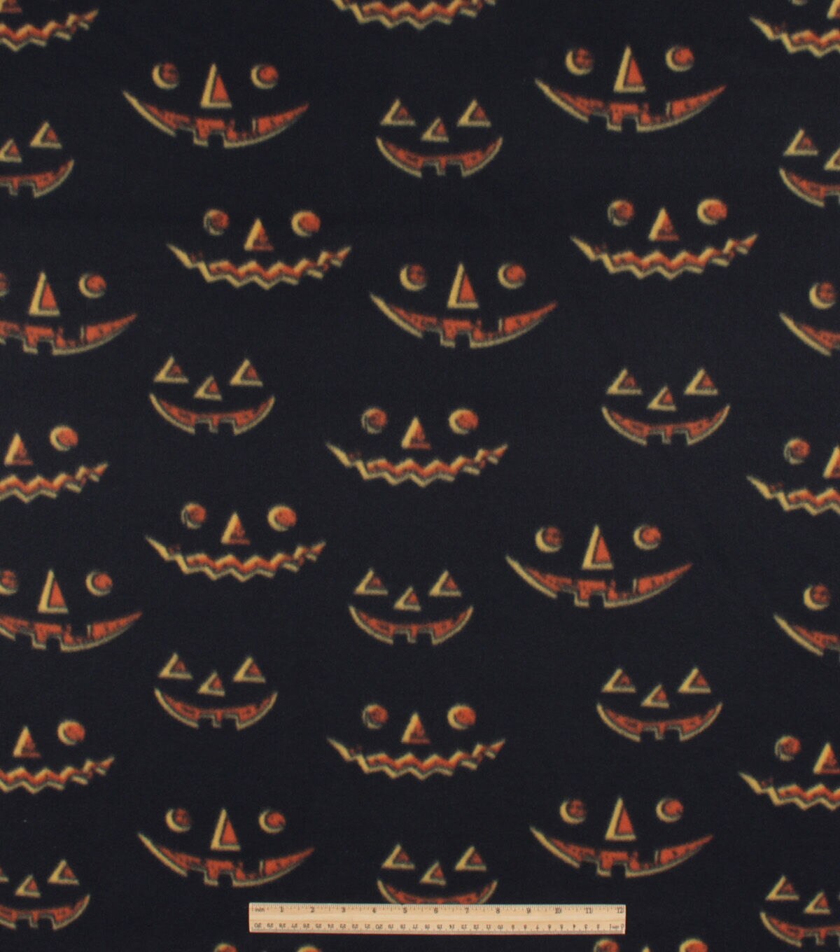 Jack O Lantern Faces Blizzard Fleece Fabric
