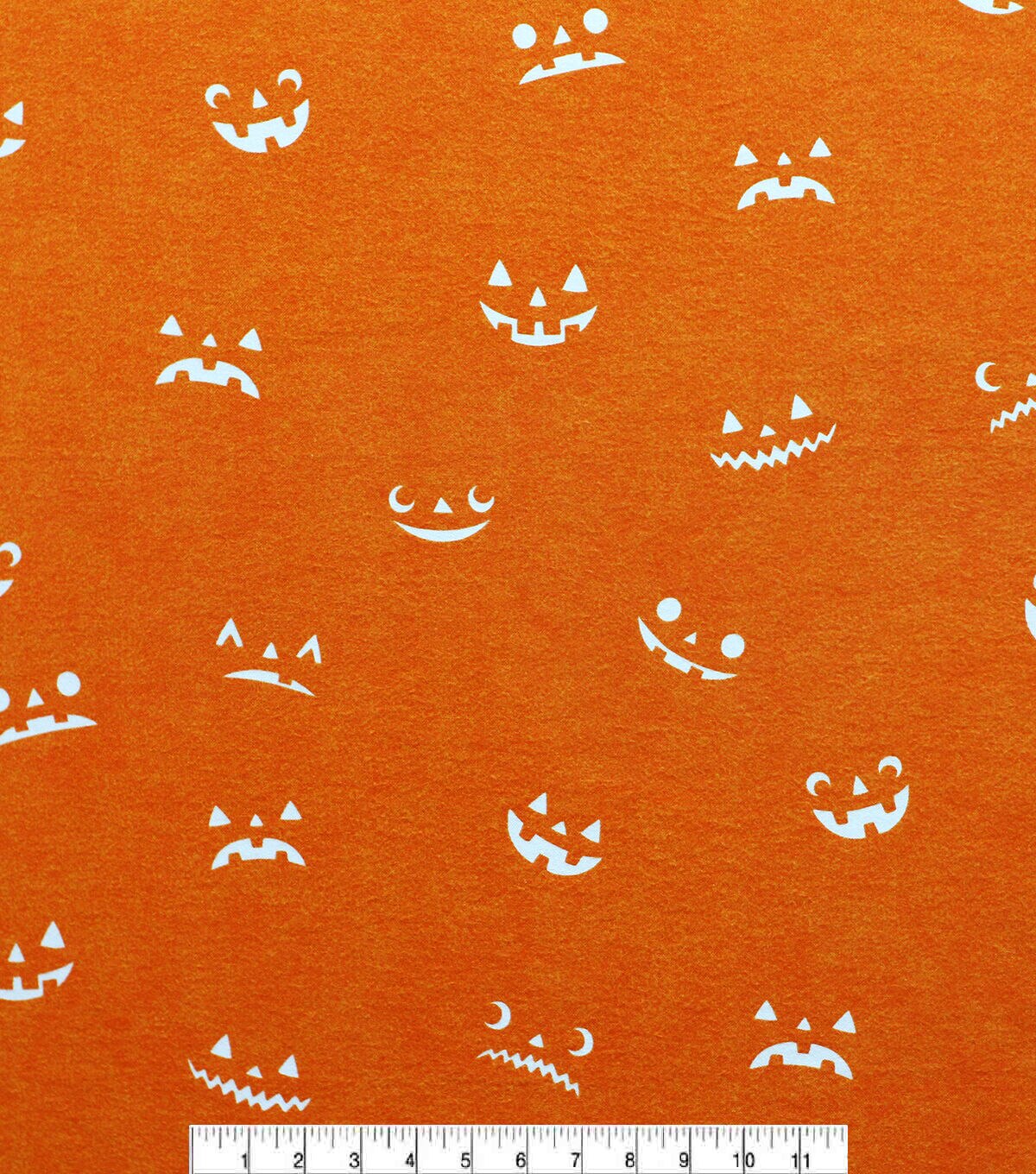 Orange Pumpkin Faces Glow in The Dark Super Snuggle Flannel Fabric